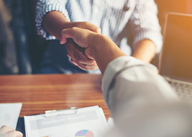 Business People Handshake Greeting Deal at work.